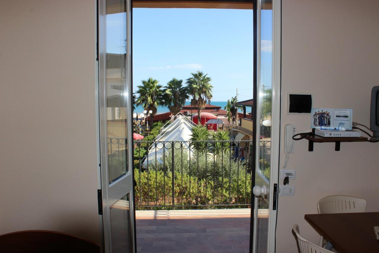 Andrea Case Vacanze L'Ancora ปอร์โต เอมเปโดเกล ภายนอก รูปภาพ